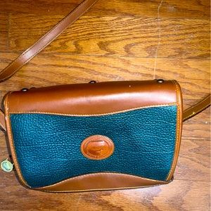 DOONEY AND BOURKE ALL WEATHER LEATHER BAG